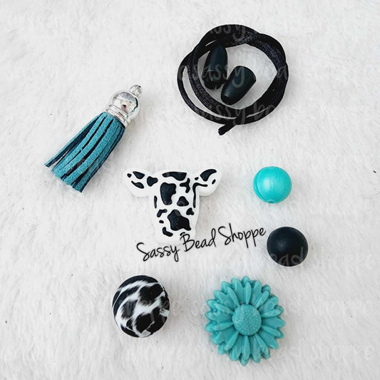 Sassy Bead Shoppe
Western Cow Black Car Charm
What you will receive in your kit
