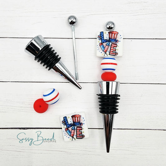 Close-up of USA-themed silicone beads in Patriotic designs for DIY wine stopper making