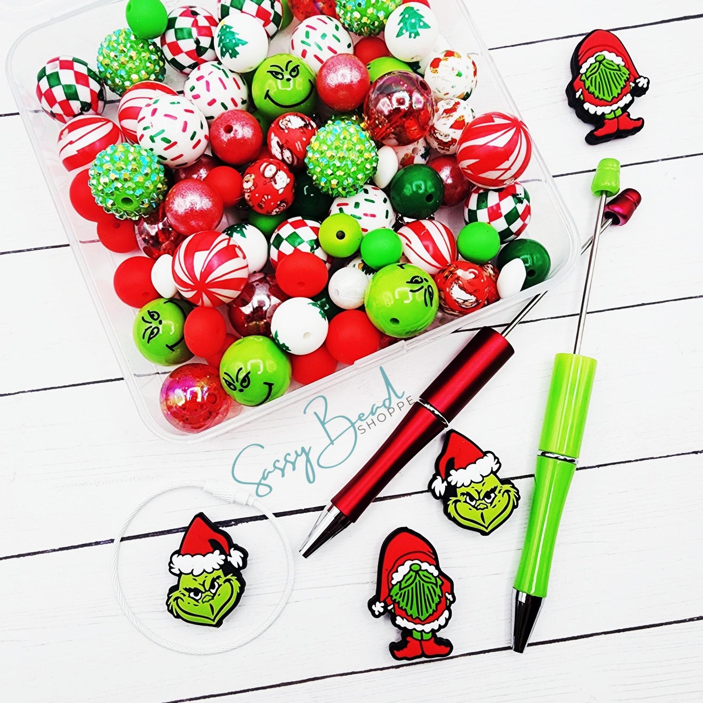 Christmas-themed acrylic & silicone beads in green guy, peppermint, Christmas tree, and Christmas designs for DIY pens, badge reels, wristlets, cookie scribes, and all your jewelry making