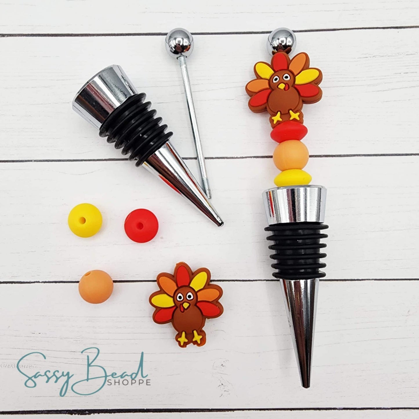 Close-up of Thanksgiving-themed silicone beads with a turkey design for DIY wine stopper