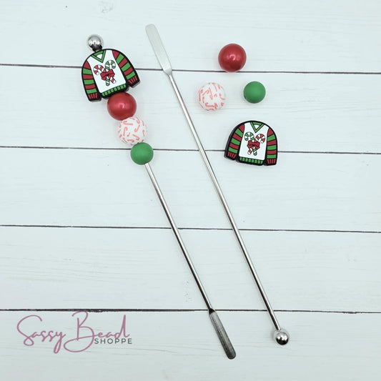 Close-up of Christmas-themed silicone beads in Christmas designs for DIY stir stick making
