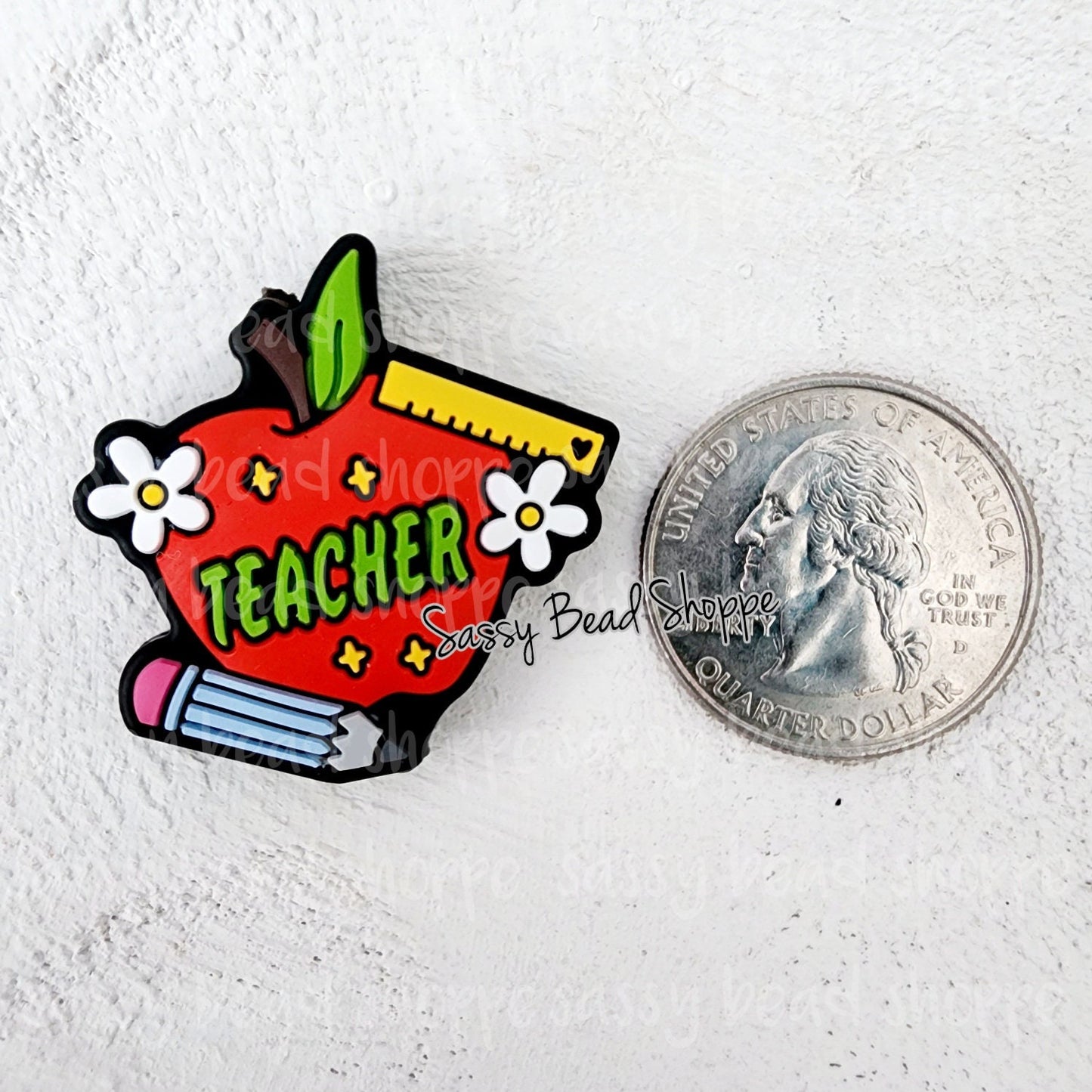 Sassy Bead Shoppe Teacher Apple Focal Bead Compared to a quarter