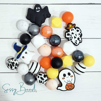 Hey Boo Bead Silicone bead mix styled flat lay showing beads for beaded pens, including seasonal designs with ghost beads