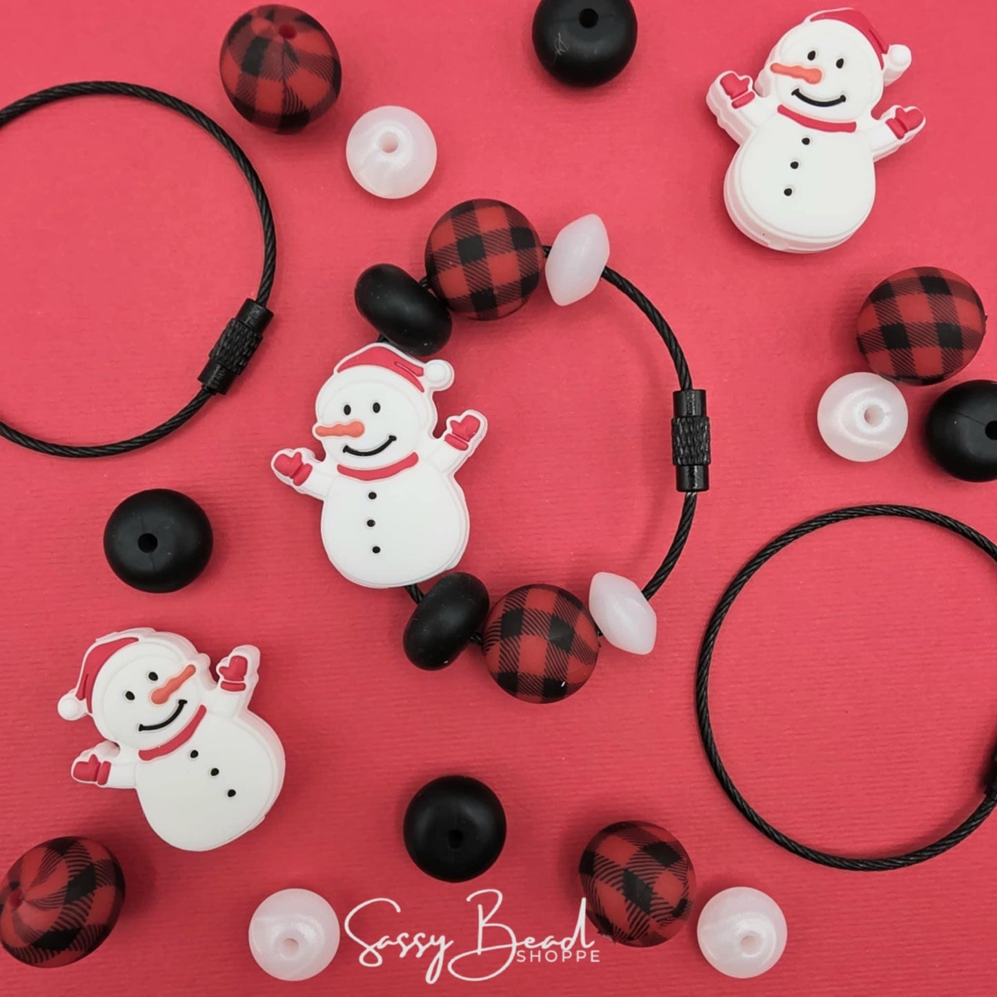 Here To Slay DIY Tumbler Charm with a fun mix of Christmas beads - Snowman focal & plaid beads — plus accent beads