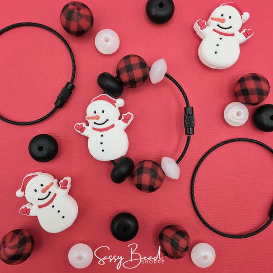 Here To Slay DIY Tumbler Charm with a fun mix of Christmas beads - Snowman focal & plaid beads — plus accent beads