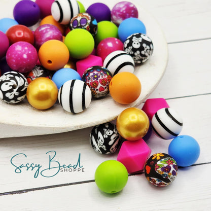 Sugar Skull Bead Mix with a fun mix of Halloween beads - skulls & crossbones and sugar skulls — plus accent beads