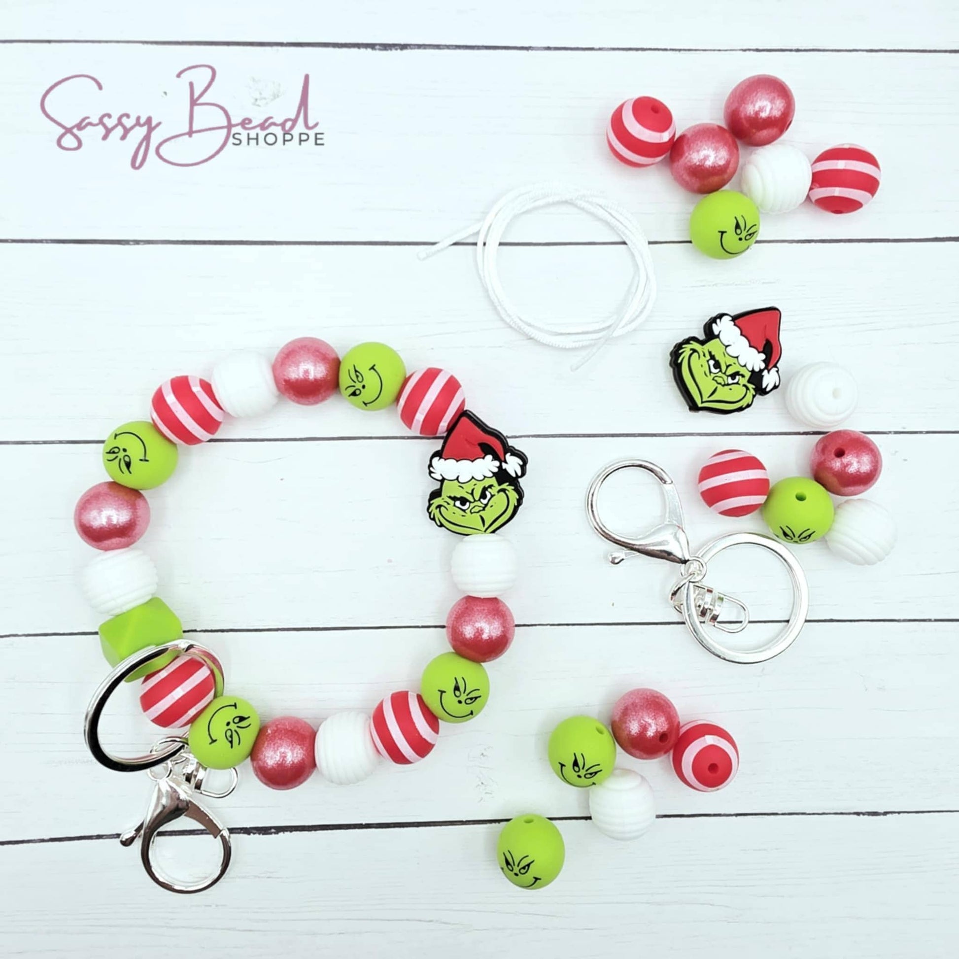 Close-up of Christmas-themed silicone beads in Christmas designs for DIY wristlet making