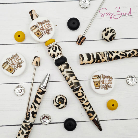Close-up of coffee-themed silicone beads in Mama needs coffee designs for DIY pen making