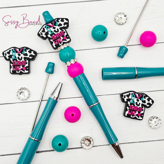 Close-up of nurse-themed silicone beads in scribe life designs for DIY pen making