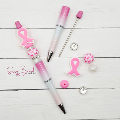 Brave in Every Stroke beadable pen kit with pink ribbon focal beads — plus accent beads