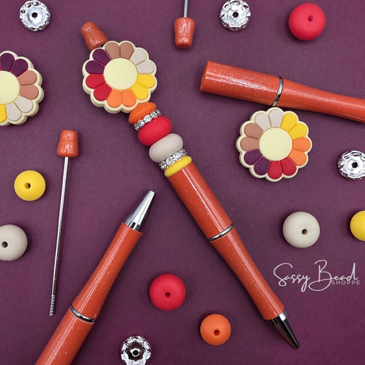 Autumn Blooms close-up of Autumn Thanksgiving-themed silicone beads in floral designs for DIY pen making